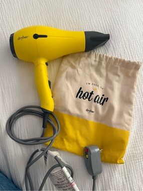 Drybar Yellow Travel Hair Dryer with Gray Nozzle and Cord